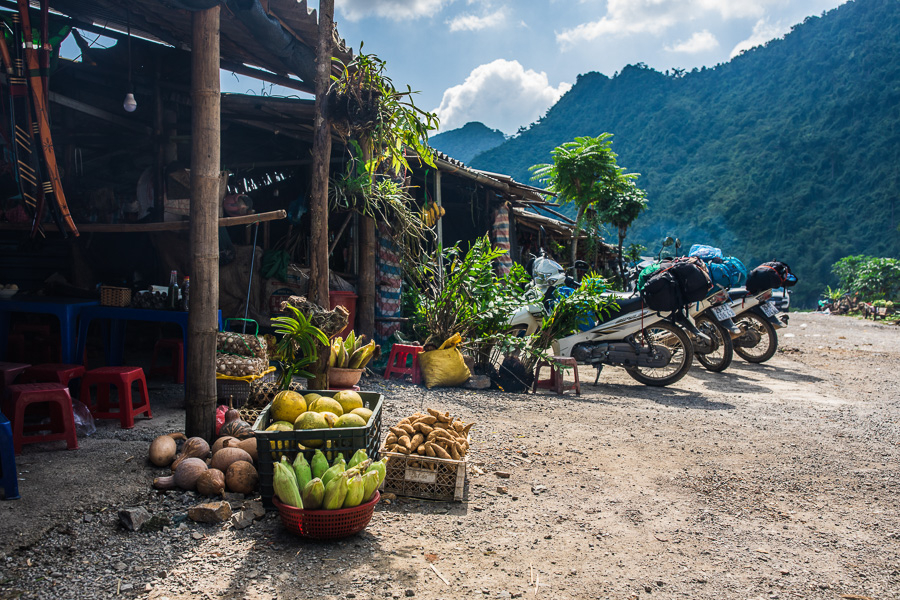 Roadside stalls outside of Mai Châu sell fruits, vegetables, and other goods to customers.