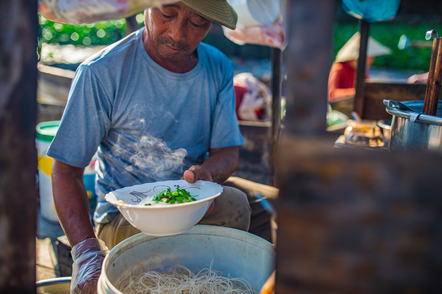 Hu tieu in the floating market is a must-have Can Tho moment.